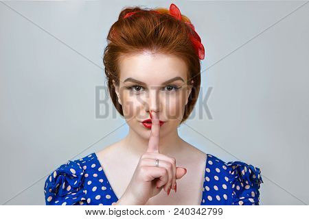 Portrait Of Attractive Young Female In Retro Outfit Concealing Top Secret Or Confidential Informatio
