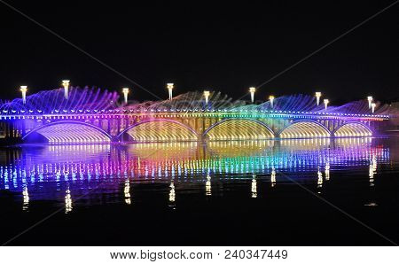Lake, bridge and fountain
. Photographed in Changchun , China