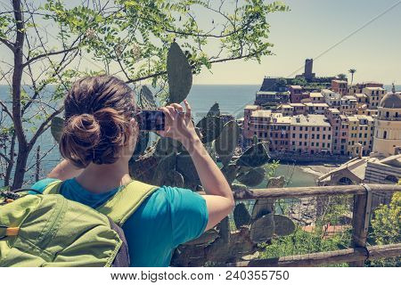 Torusit Taking A Photo Of Picturesque Sea Town. Vernazza In Cinque Terre, Italy.