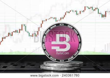 Bytecoin (bcn) Cryptocurrency; Physical Concept Coin Bytecoin On The Background Of The Chart