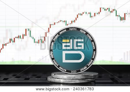 Digixdao (dgd) Cryptocurrency; Physical Concept Digixdao Coin On The Background Of The Chart