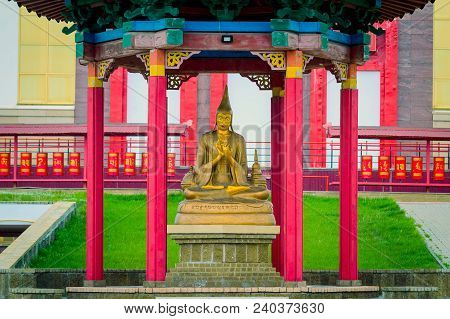 One Of Teacher Of Buddhism Statues Outside Of The Temple Building. Biggest In Russia And Europe Budd
