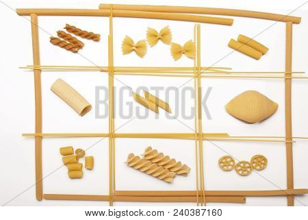 Different Types Of Italian Pasta Enclosed In A Frame Of Pasta On The White Background