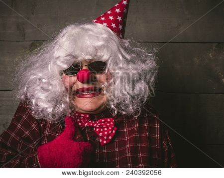 Funny Droll Silly Clown With Blonde Wig And Red Nose