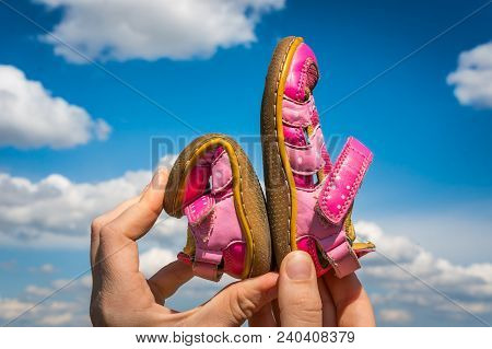 Woman Is Holding Barefoot Shoes With Flexible Sole - Barefoot Shoes Concept