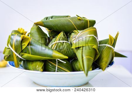 Zongzi In White Plate. Zongzi Is The Traditional Chinese Rice Dumplings For Dragon Boat Festival (du