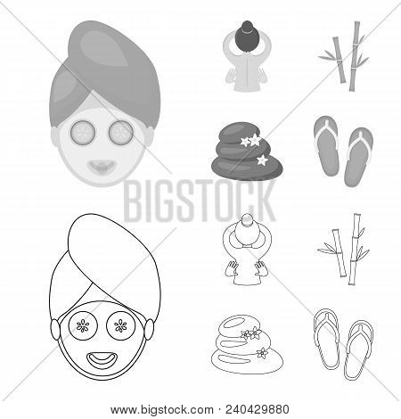 Face With A Cosmetic Mask With Cucumbers, Massage Hands, Bamboo, Stones With Lotus Flowers. Spa Set 