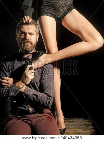 Romance And Couple In Love. Legs Of Woman In Shoes At Man With Beard. Man In Shirt Isolated On Black