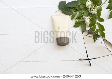 Natural Cosmetics For Skin Face Sunscreen Spf50 And Sunglasses Of Lifestyle Woman Relax  Summer