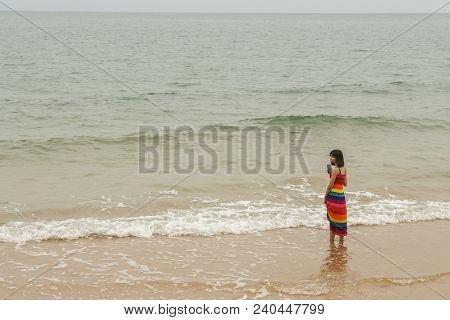 Cute Girl On Colorful Maxi Dress At Sea Shore On Vacation Taken In Chantaburi Thailand On 21 April 2