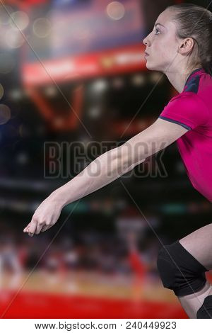 Female Professional Volleyball Player On Volleyball Court.