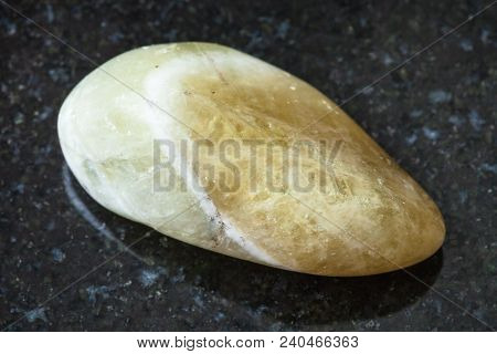 Macro Shooting Of Natural Rock Specimen - Tumbled Prasiolite (green Quartz , Vermarine) Stone On Bla