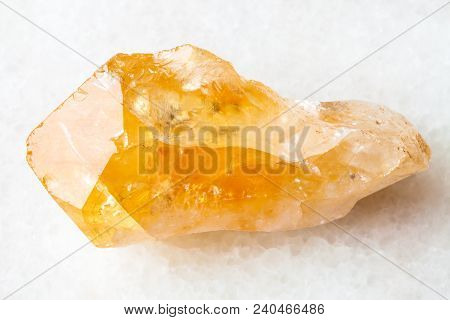 Macro Shooting Of Natural Rock Specimen - Raw Crystal Of Citrine (yellow Quartz) Gemstone On White M