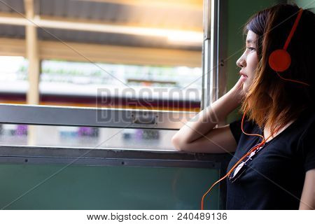 Portrait Charming Beautiful Lovely Woman. Attractive Girl Is Listening Sad Music That Make Her Feeli