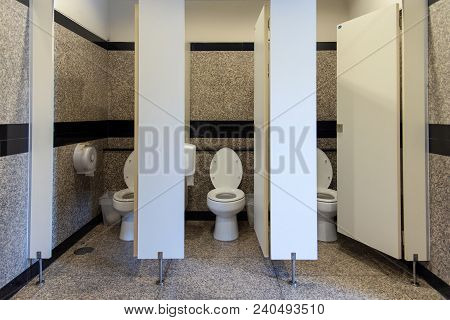 Flush Toilet In Public Three Rooms Toilet And Open Door