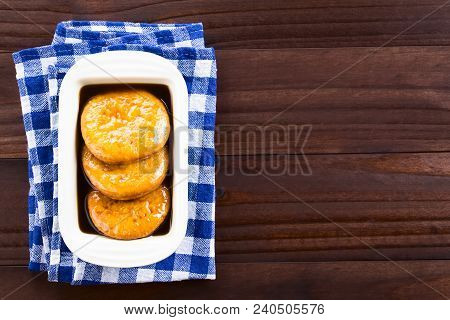 Chilean Sopaipilla Pasada Deep-fried Pastry Covered In Chancaca Cane Sugar Sauce, A Popular Snack In