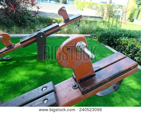Children Playground, Wooden Horse Seesaw, Teeter Totter Or Teeterboard In Outdoor Park.