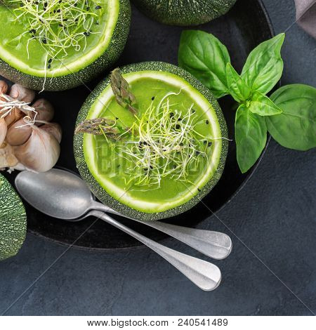 Seasonal Creamy Asparagus Spinach Soup Served In A Round Zucchini