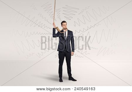 Hopeless young businessman trying to suicide with question signs concept