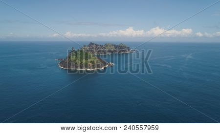 Small Rocky Islands In The Sea, Blue Sky And Clouds. Dos Hermanas, Palau, Santa Ana. Aerial View Of 