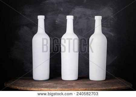 Wine Bottle Mock-up. Red Wine Bottle On Wooden Background