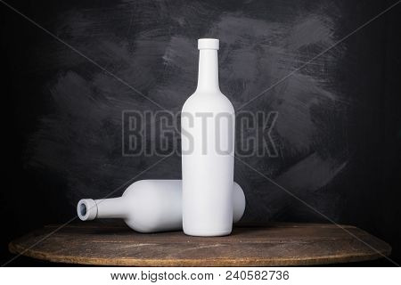 Wine Bottle Mock-up. Red Wine Bottle On Wooden Background