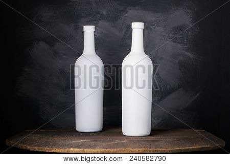 Wine Bottle Mock-up. Red Wine Bottle On Wooden Background