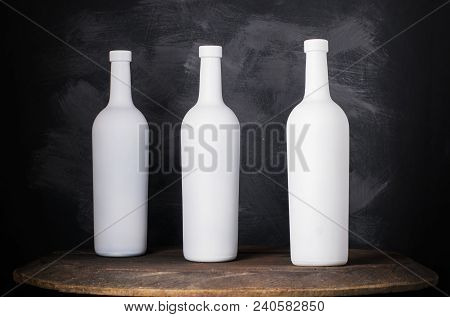 Wine Bottle Mock-up. Red Wine Bottle On Wooden Background