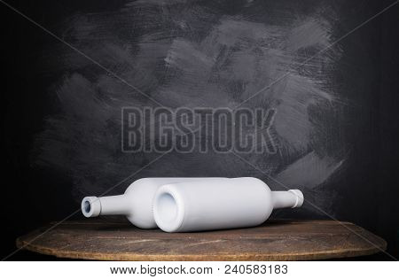 Wine Bottle Mock-up. Red Wine Bottle On Wooden Background