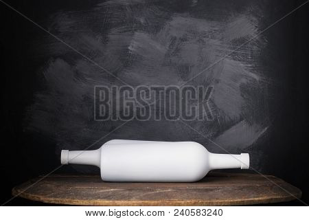 Wine Bottle Mock-up. Red Wine Bottle On Wooden Background