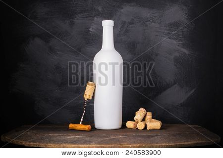 Wine Bottle Mock-up. Red Wine Bottle On Wooden Background