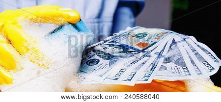 Close Up Process Of Transforming The Profits Of Crime And Corruption Into Ostensibly 