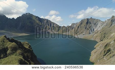 Crater Lake Of The Volcano Pinatubo Among The Mountains, Philippines, Luzon. Aerial View Beautiful L