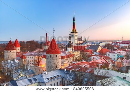Aerial Cityscape With Medieval Old Town, St. Olaf Baptist Church And Tallinn City Wall In The Mornin