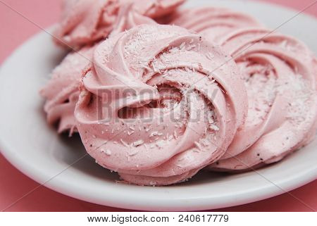Pink Homemade Marshmallows Or Zephyr. Pink Strawberry Desert Over Pink Background.