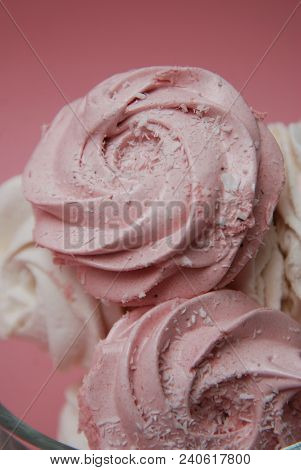 Close Up Pink Homemade Strawberry Marshmallows Or Zephyr. Pink Desert Over Pink Background
