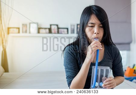 Patient Using Incentivespirometer Or Three Balls For Stimulate Lung