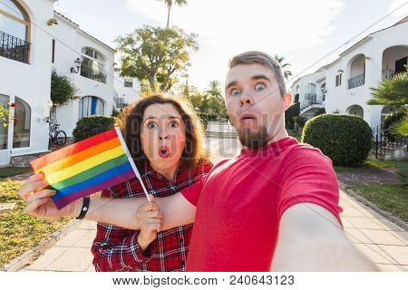 Young Man And Woman Surprised When The First Time Came Gay Parade.