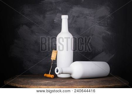 Wine Bottle Mock-up. Red Wine Bottle On Wooden Background
