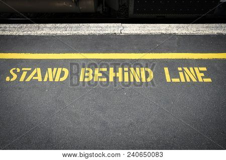 A Safety Sign Painted On A Railway Platform In South Island Of New Zealand