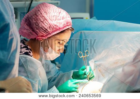 Female Surgeons During The Operation, Face Close-up