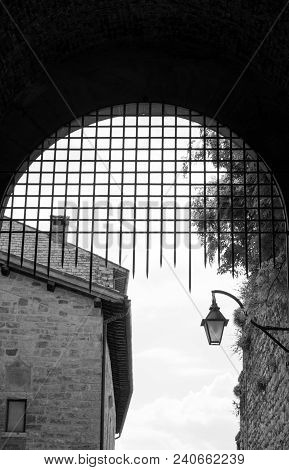 View Of Iron Gate Of Town Hall In The Medieval City Of Gubbio From Inside
