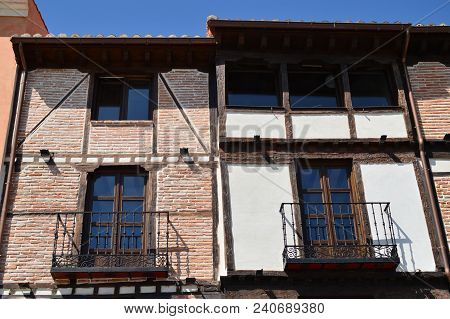 Wonderful Facades Of Houses Dating From The Middle Ages In The Main Street Of Alcala De Henares. Arc