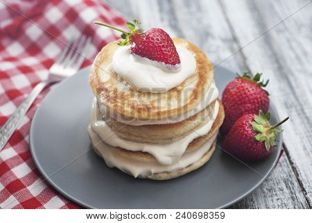 Sweet Pancakes With Cream And Strawbery. Health Breakfast Fruit Berry Vitamine Gray Rustic Backgroun