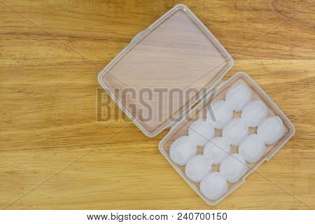 6 Pairs of Waterproof Earplugs, soft moldable silicone putty. Helps prevent swimmerÃ¢??s ear, snore proof with comfort, top view on wooden background