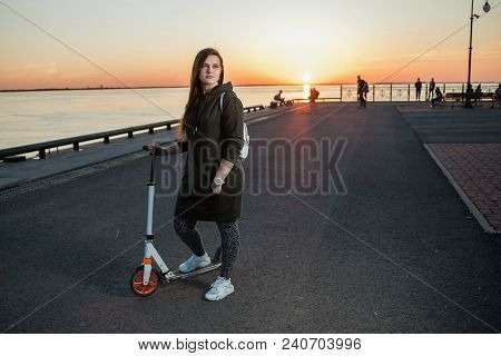 Urban Style And Fashion Concept. Outdoor Portrait Of Beautiful Stylish Young European Female Model W
