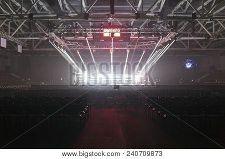 Brovary, Ukraine, 14.11.2015 Empty Boxing Ring In The Light Of Searchlights, Around It The Empty Sea
