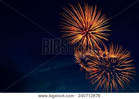 Brightly Colorful Fireworks And Salute Of Various Colors In The Night Sky.