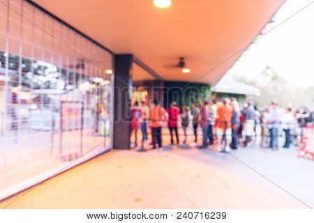 Abstract Blurred Long People Queuing In Front Of Zoo Entrance In Usa