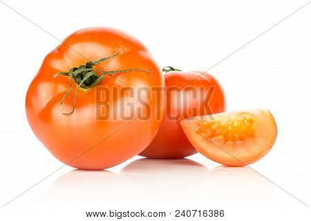 Two Red Tomato With One Slice Isolated On White Background